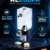 RIGLOOP RL200PR Pump and Reservoir Combo featuring a transparent 200ml reservoir and 12V 20W BLDC pump, with ultra-quiet operation, plug-and-play connectivity, and Made in India branding, displayed in a futuristic blue-lit product advertisement.